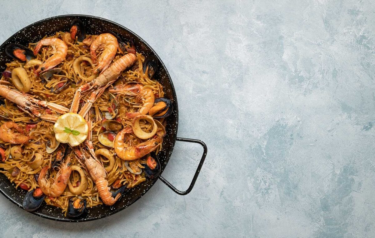 A fideua with prawns and langoustines